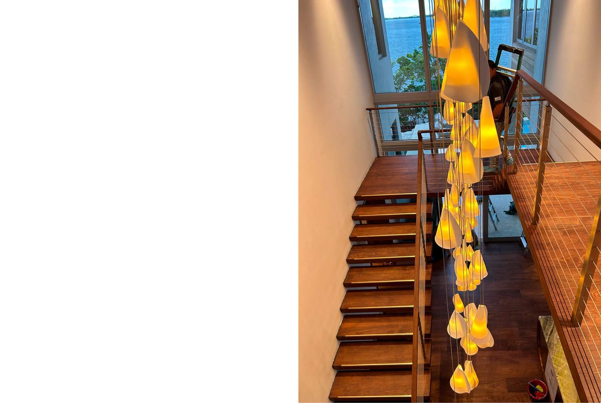Staircase pendant lighting installed by Eastern Electric Solutions